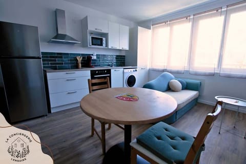 ESPACE REPAS OUVERT SUR CUISNE ET SALON