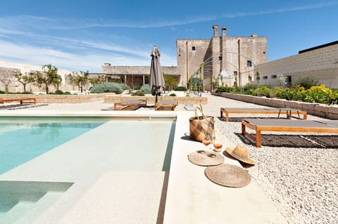 Amenities, Building Exterior, Garden, Pool, Spring, Summer