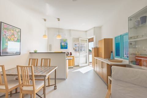 Apartment, 1 Queen Bed with Sofa bed, Sea View | Living area | 30-inch TV with satellite channels