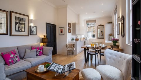 Subtle colours with pops of brightness make this a characterful room.