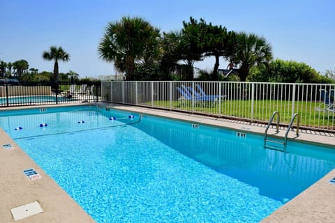 Cool off in the sparkling outdoor pool with plenty of space to lounge.