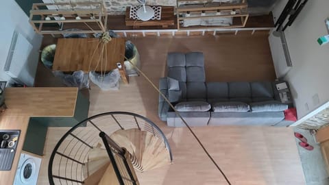 Mezzanine view of dining table and full living space.jpg