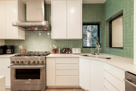 Fully Equipped Kitchen with Stainless Steel Appliances and Plenty of Space to Entertain