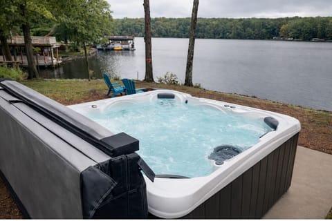 Hot Tub Retreat: Soak in lakeside luxury while enjoying stunning water views!
