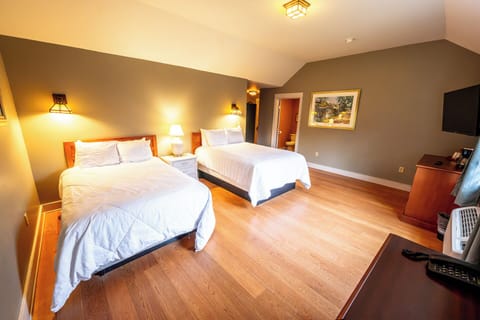 Sink into crisp beds in this spacious, calming retreat.