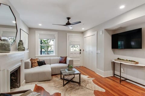 Living Room | Lounge Area with TV and Fireplace | First Floor of Building — Unit on One Level