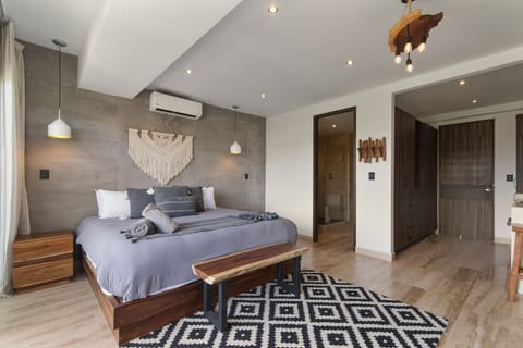 Stylish bedroom with cozy bed, modern decor & warm wood accents