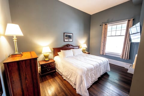Sink into plush bedding in this calm, sunlit retreat.