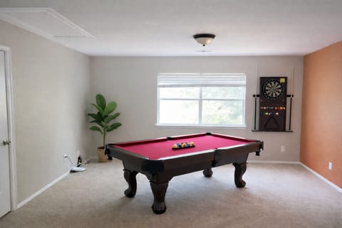 Kick back after work in our game room at Crew Stay, Aubrey TX. A great long-term stay option for crews and workers.