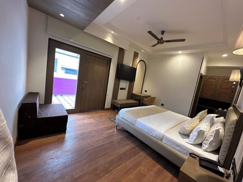 Family Suite, Balcony, City View | Minibar, in-room safe, soundproofing, iron/ironing board