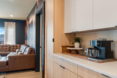 From enjoying your morning coffee in the kitchen to unwinding in the living room on the sleeper sofa in the evening, this space offers everything you need