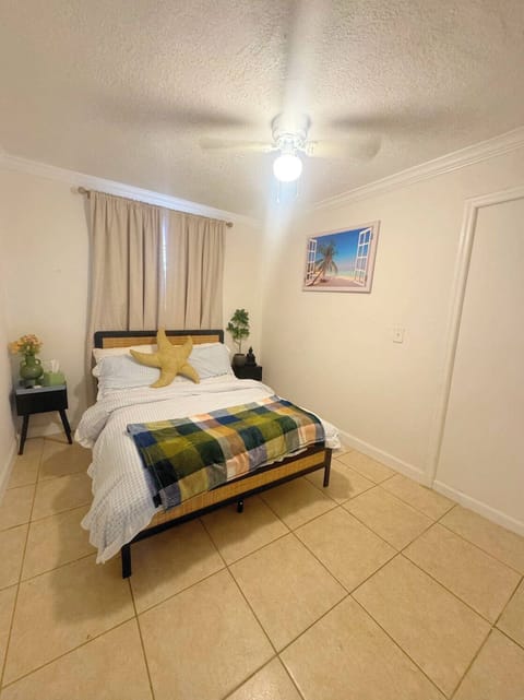Full size bed, duvet and 2 sets of pillows. Fits two adults. Blackout curtains. 