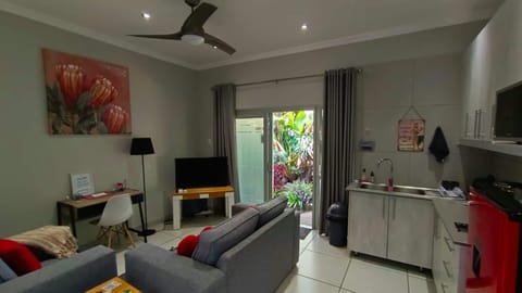 Family Double Room, Patio, Garden View | Living room | 52-inch Smart TV with satellite channels, Netflix, books