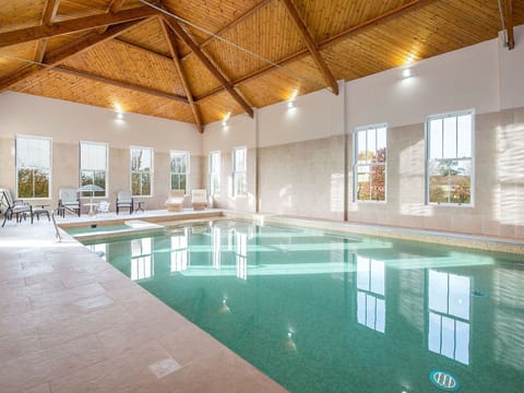 Flooring, Ceiling, Swimming Pool, Floor, Resort, Tile, Design, Hotel, Daylighting