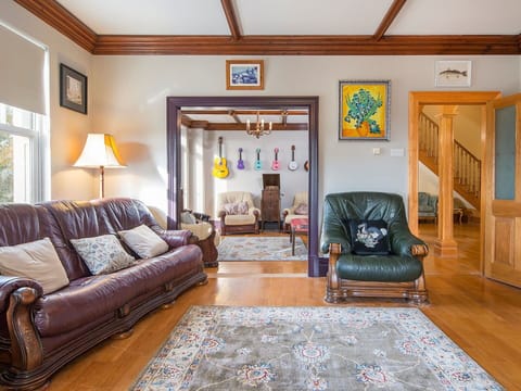 Furniture, Interior Design, Flooring, Floor, Couch, Wood, Ceiling, Living Room, Wood Flooring, Room