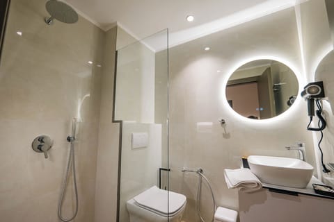 Double Room | Bathroom | Shower, hair dryer, towels, soap