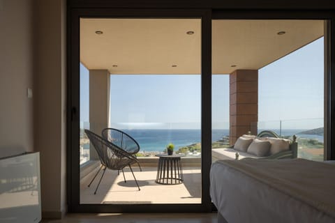 Luxury Villa, Sea View | Living area | 50-inch Smart TV with digital channels, fireplace