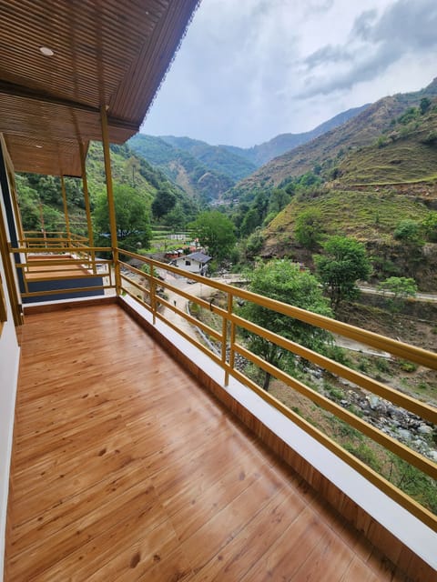 Deluxe Double Room, Balcony, Valley View | Desk, laptop workspace, soundproofing, iron/ironing board