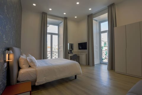 Superior Room, Balcony, City View | In-room safe, desk, laptop workspace, blackout drapes