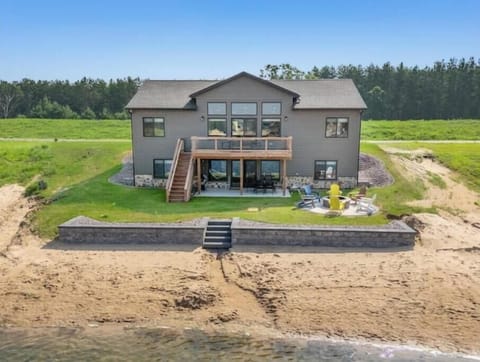 deck and patio, firepit, private access beach on Sunset Lake, outdoor activities