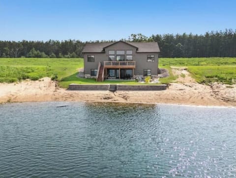 deck and patio, firepit, private access beach on Sunset Lake, outdoor activities