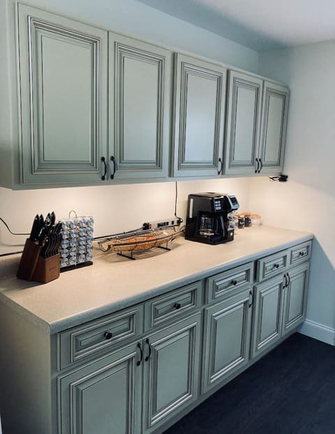 Unit B kitchen with coffee maker.