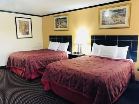 Standard Room, 2 Queen Beds | Individually decorated, individually furnished, desk, laptop workspace