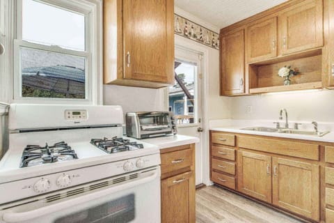 Full kitchen with gas stove and toaster oven