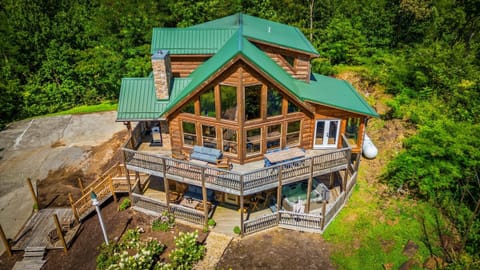 Soak in this aerial look at your dream escape—spacious decks, endless fun, and room for everyone to relax, play, and make memories.
