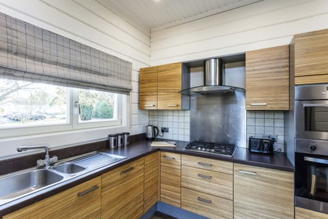 Roydon Lodge | Private kitchen | Fridge, oven, stovetop, coffee/tea maker