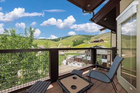 Enjoy our patio with seating and stunning slope side views