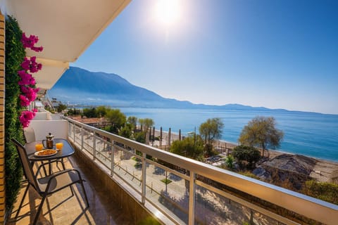 Private balcony with flowers and unobstructed sea views