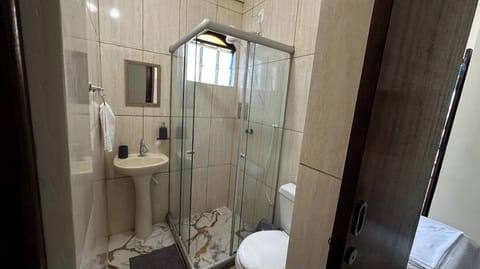 Deluxe Triple Room, Garden View | Bathroom | Towels, soap, toilet paper