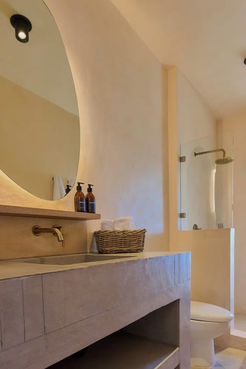 Suite, Balcony, Pool View | Bathroom | Shower, hair dryer, towels, soap