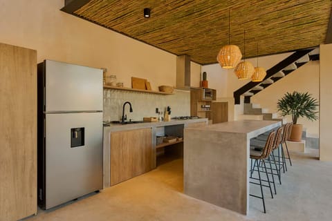 Suite, Balcony, Pool View | Shared kitchen | Fridge, microwave, oven, espresso maker