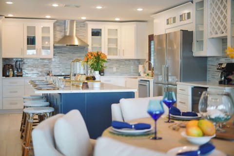 The gourmet kitchen is a beautiful place to prepare home cooked meals