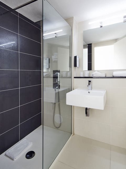 Eco-friendly toiletries, hair dryer, towels