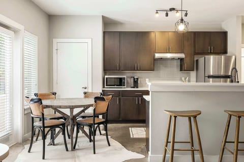 Cook, gather, and connect in the fully equipped kitchen designed for both function and style. 