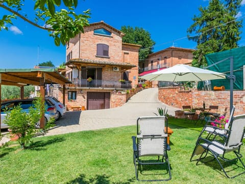 Furniture, Outdoor Furniture, Chair, Garden, Outdoor Table, Backyard, Shade, Yard, Patio, Lawn