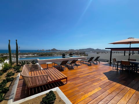 Relax by our rooftop pool, overlooking Land's End.
