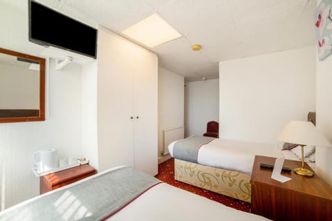 Desk, laptop workspace, free WiFi, bed sheets