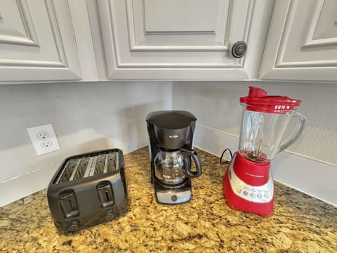 The open, airy kitchen offers ample space & every home comfort​