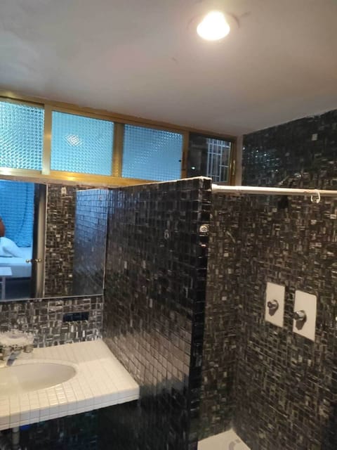 Shower, towels, soap, shampoo