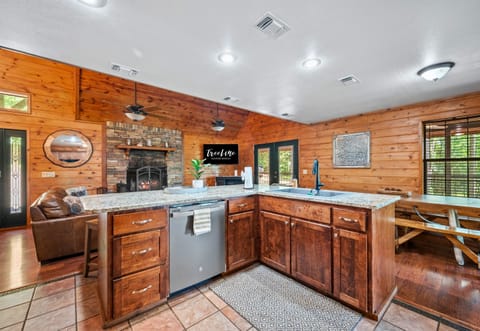 Open-concept layout with modern appliances, coffee station, and plenty of prep space.