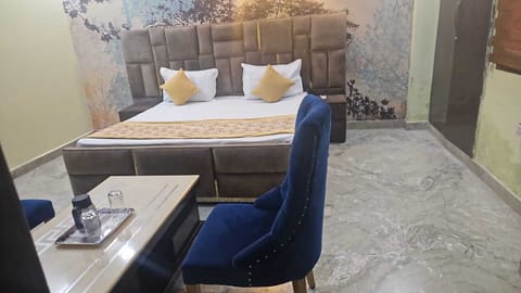 Luxury Apartment, 1 Bedroom, Balcony, City View | Desk, laptop workspace, soundproofing, iron/ironing board