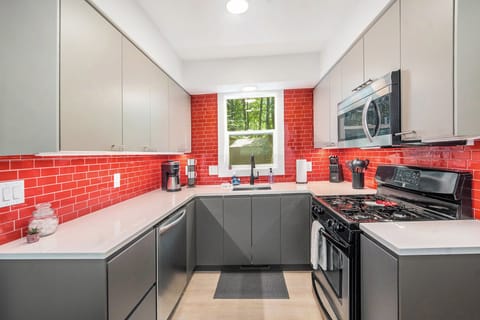 Kitchen - Fully equipped Kitchen with Refrigerator, Range, Microwave, and Dishwasher