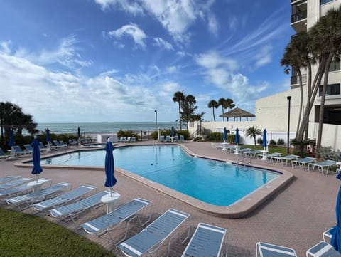 Large heated and beachfront pool at the community with plenty of - Large heated and beachfront pool at the community with plenty of lounge chairs and umbrellas