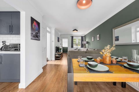 Open-plan dining and kitchen area with plenty of space for the whole group to sit down and enjoy a meal together