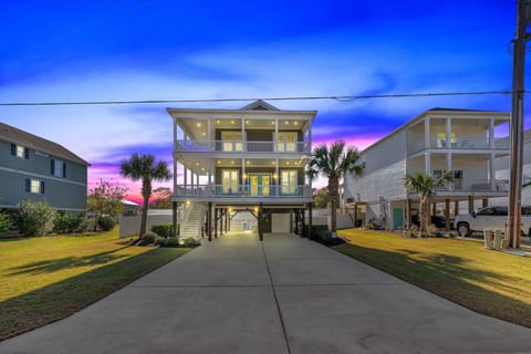 Welcome to Resting Beach Place – your dreamy coastal escape with wraparound decks, palm trees, and beach vibes from the moment you pull up!