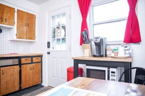 Our coffee station includes a single serve Keurig, k-cups, creamer, sugar, and tea packets.